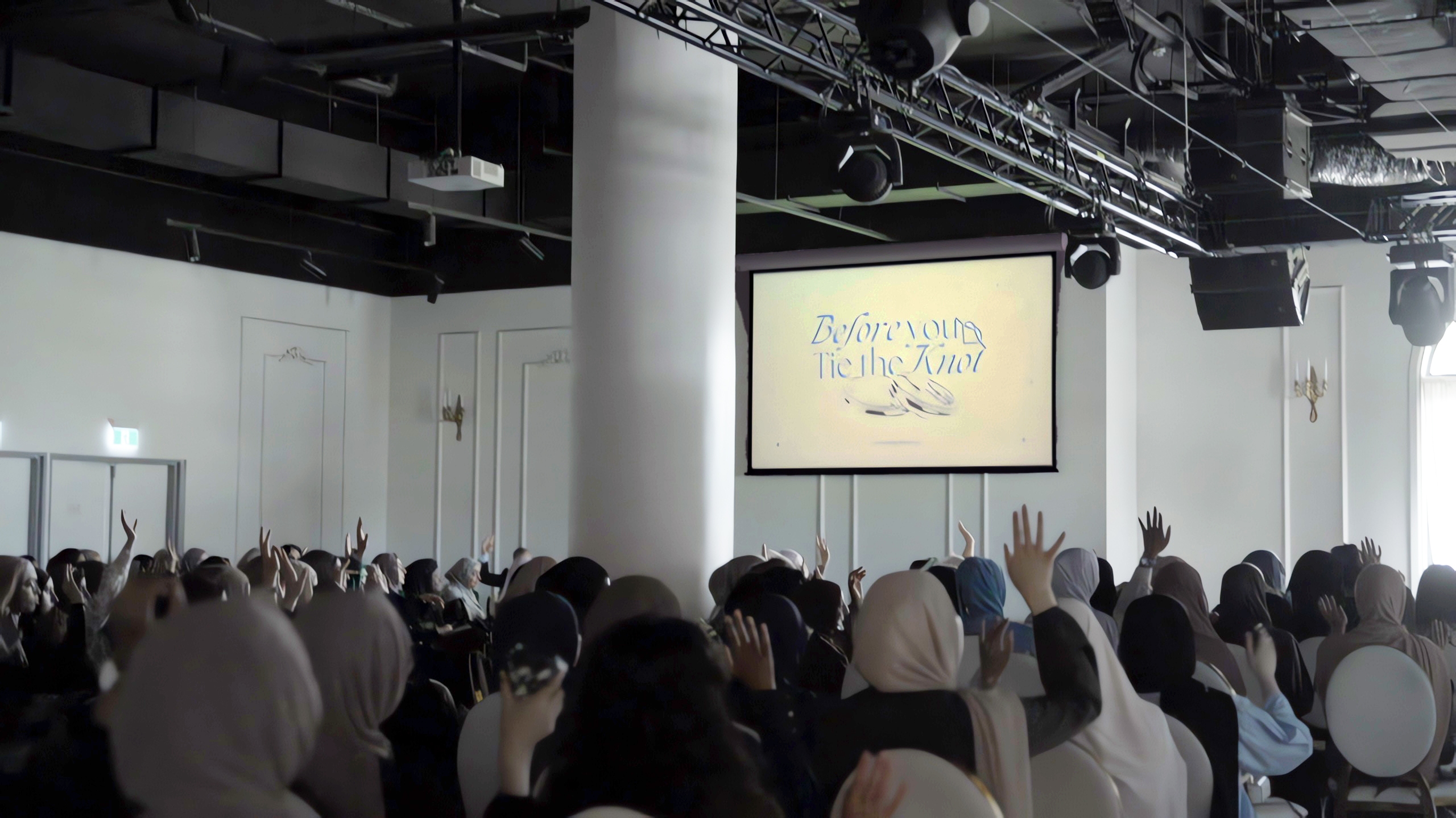 Females Raising Hand To Question